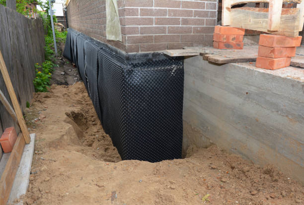 Happy homeowners after waterproofing job in Groveoak